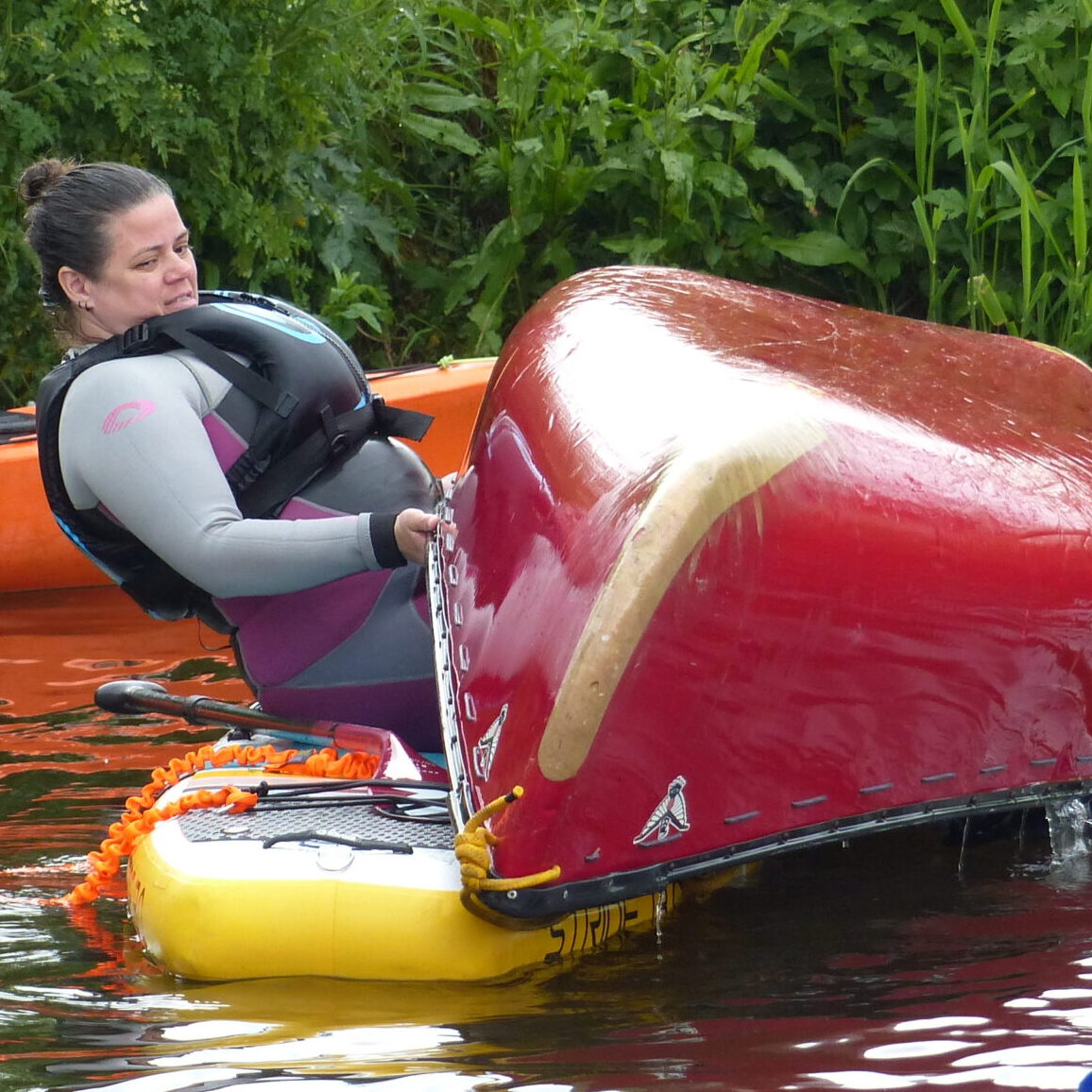 Coaching 4 Rescuing a canoe, from a SUP